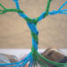 mermaid blue and light green wire twisted into tree trunk colors blend together to create an enchanted look